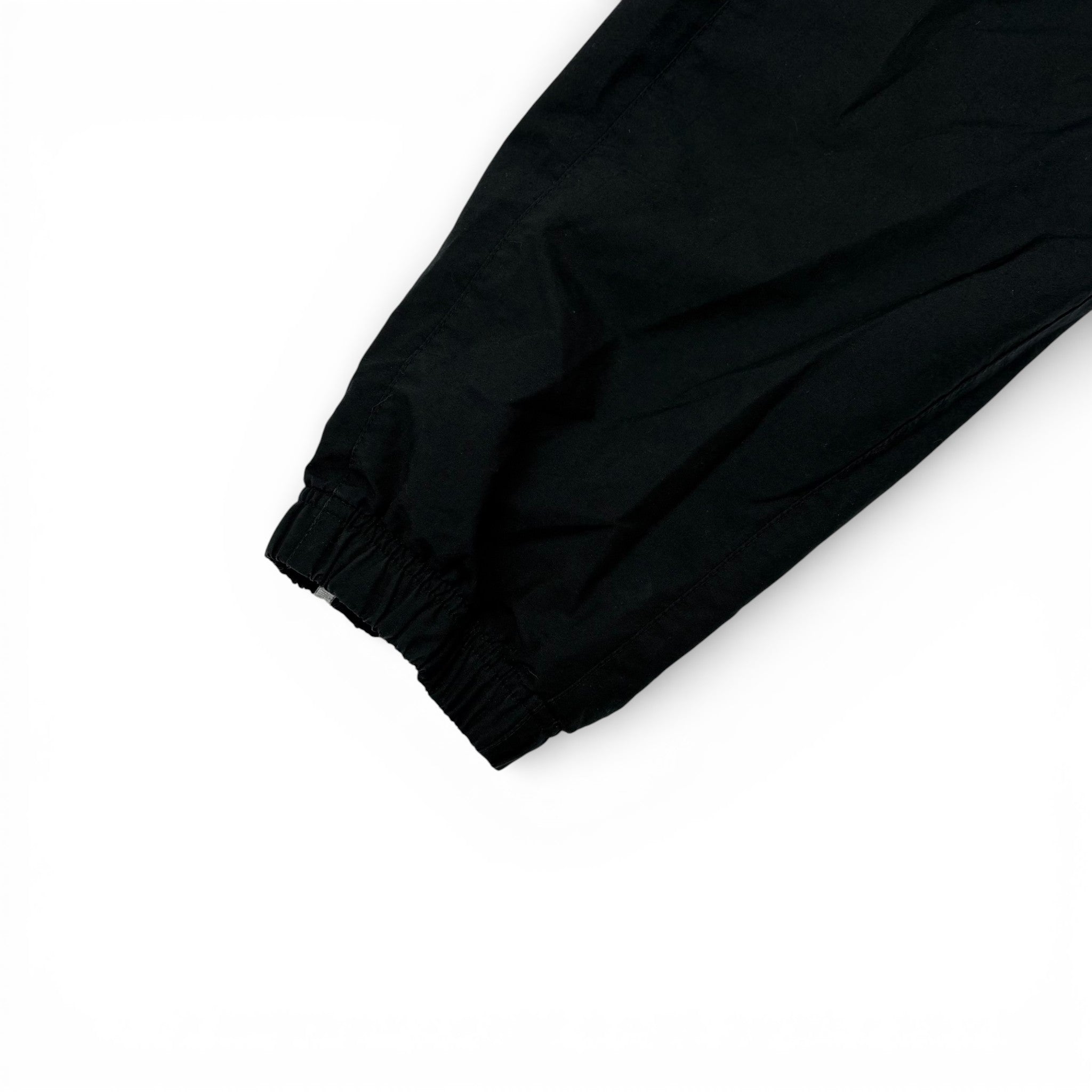 Nike Trackpants Schwarz mit Bein-Print