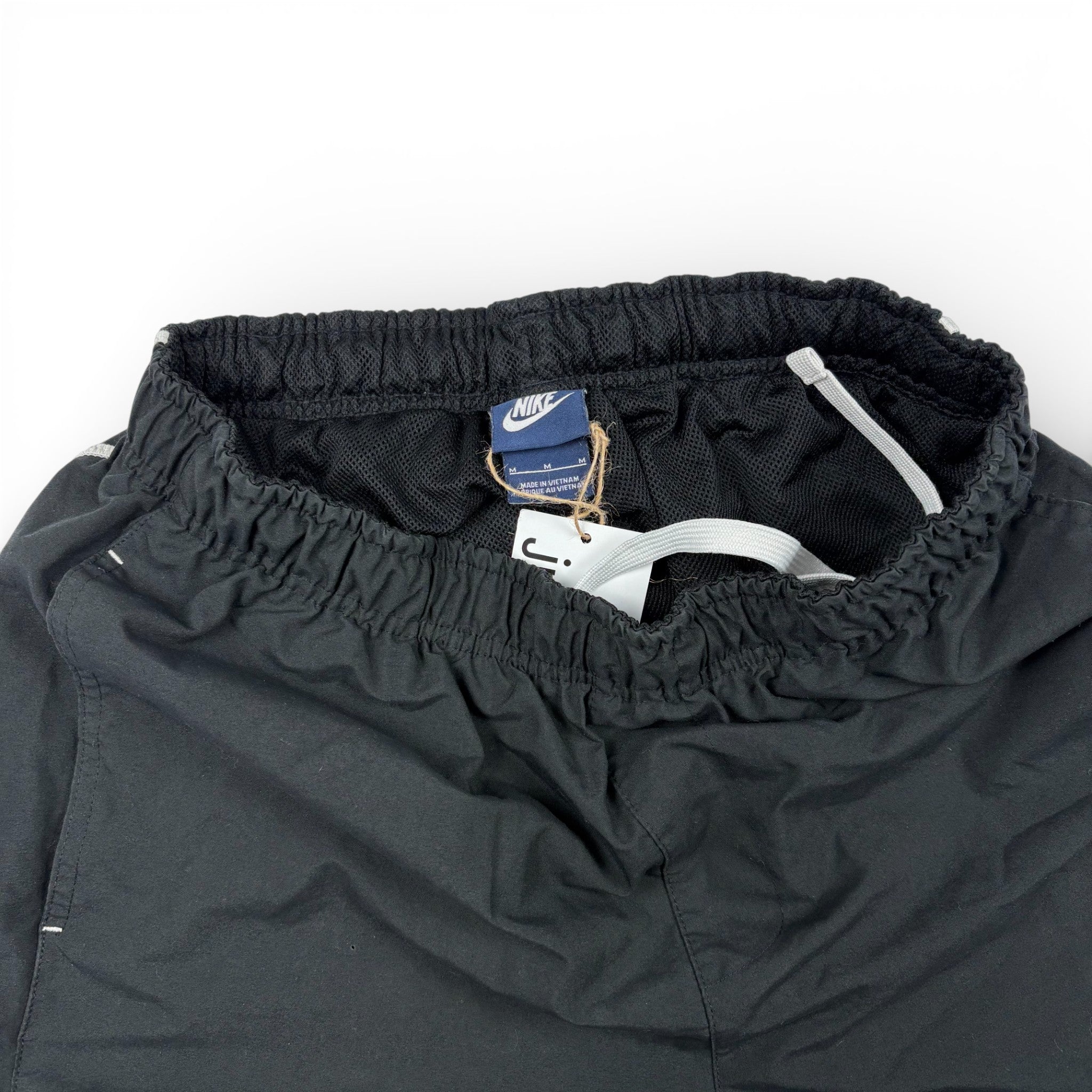 Nike Trackpants Schwarz mit Bein-Print