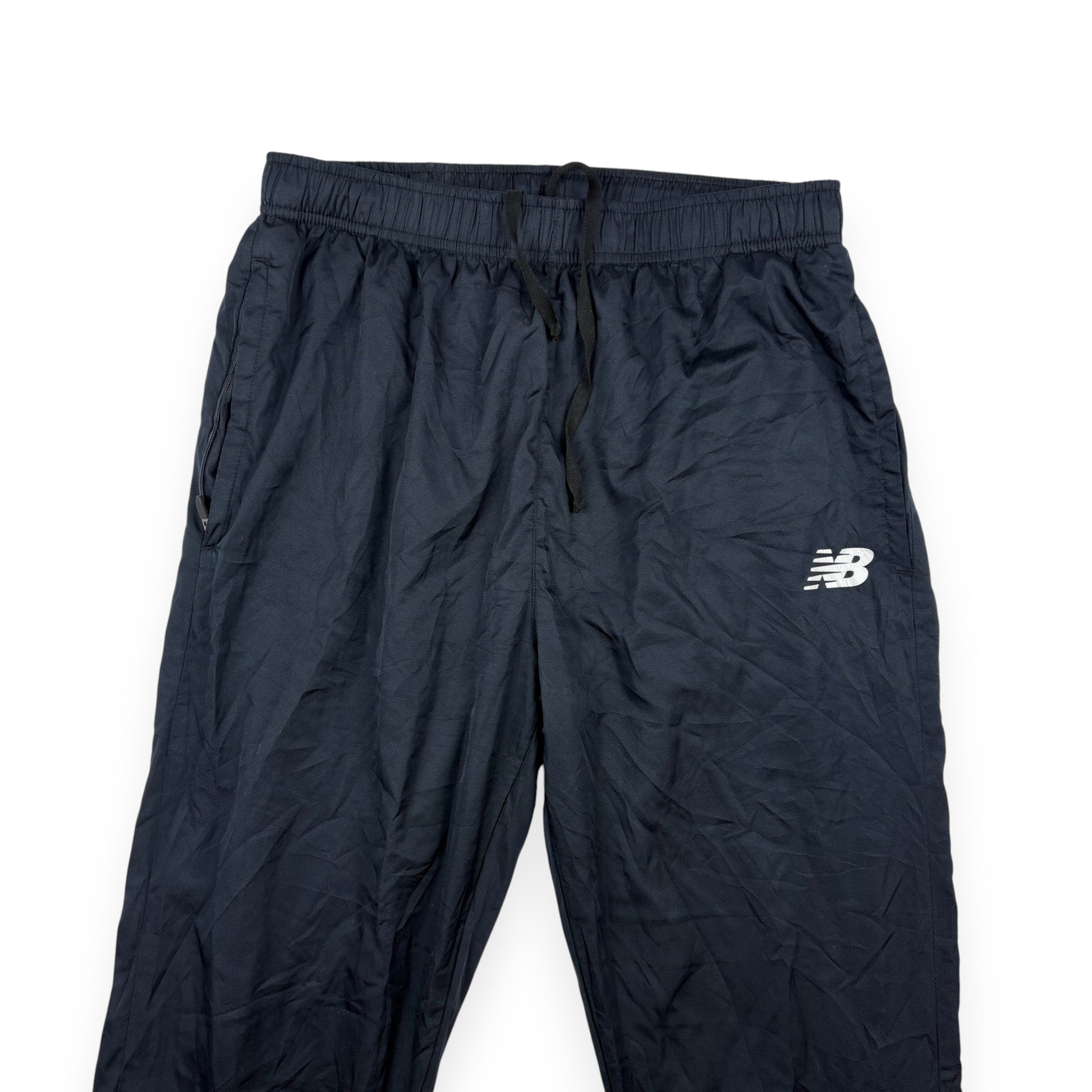 New Balance Trackpants Dunkelblau/Schwarz